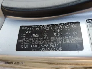 2005 Kia Spectra LX with VIN KNAFE122855179475, listed as a Copart auction lot 66996474 with 187,674 mi miles and Salvage Title. Bid and sale history available at carsss.com. Image 12.
