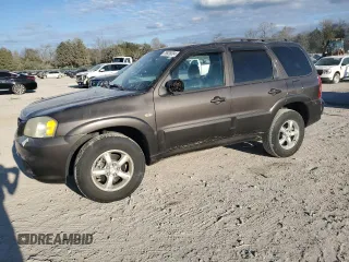 2006 Mazda Tribute S with VIN 4F2YZ04116KM23873, listed as a Copart auction lot 79926084 with 67,142 mi miles and Salvage Title. Bid and sale history available at carsss.com. Image 1.