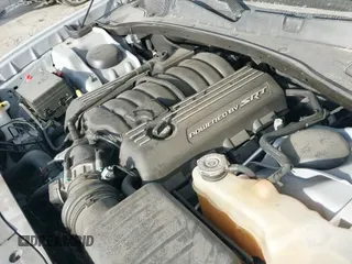 2021 Dodge Charger Scat Pack z VIN 2C3CDXGJ7MH594777, wystawiony jako IAAI lot #43044838 z przebiegiem 75 520 mil mil oraz . Historia ofert i sprzedaży dostępna na DreamBid. Obrazek 21.