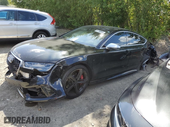 2016 Audi RS 7 Prestige z VIN WUAW2AFC7GN904309, wystawiony jako Copart lot #61766944 z przebiegiem 54 914 mil mil oraz Czysty tytuł • Clean title. Historia ofert i sprzedaży dostępna na DreamBid. Obrazek 1.