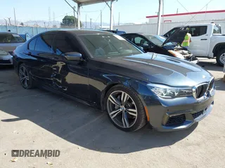2019 BMW 7 Series 740i with VIN WBA7E2C53KB218375, listed as a IAAI auction lot 42008827 with 61,337 mi miles and . Bid and sale history available at DreamBid. Image 1.