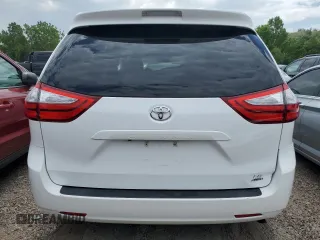 2015 Toyota Sienna LE with VIN 5TDJK3DC2FS126466, listed as a Copart auction lot 61165105 with 56,634 mi miles and Salvage title. Bid and sale history available at DreamBid. Image 6.