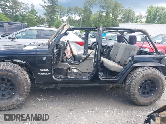 2008 Jeep Wrangler Unlimited Sahara with VIN 1J4GA59138L501621, listed as a IAAI auction lot 42245134 with 241,361 mi miles and . Bid and sale history available at DreamBid. Image 14.