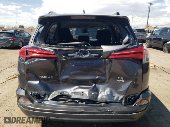 2017 Toyota RAV4 LE z VIN JTMBFREV0HJ703801, wystawiony jako Copart lot #60272025 z przebiegiem 73 370 mil mil oraz Szkoda całkowita • Salvage title. Historia ofert i sprzedaży dostępna na DreamBid. Obrazek 6.