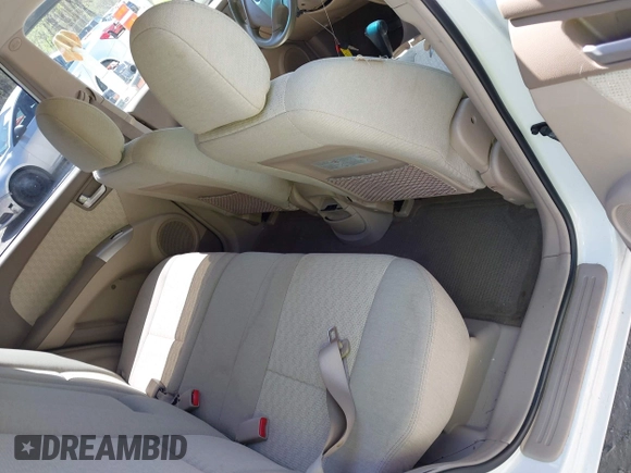 2006 Kia Sportage LX with VIN KNDJF723567151614, listed as a IAAI auction lot 42022102 with 128,564 mi miles and . Bid and sale history available at carsss.com. Image 8.
