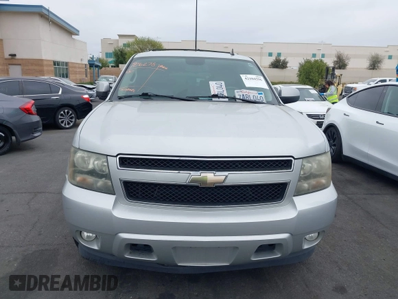2010 Chevrolet Suburban LT with VIN 1GNUCJE03AR238548, listed as a IAAI auction lot 42104596 with 153,959 mi miles and . Bid and sale history available at DreamBid. Image 12.