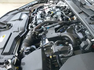 2025 Toyota Prius LE z VIN JTDADABU2S3026888, wystawiony jako IAAI lot #42489089 z przebiegiem 1 350 mil mil oraz . Historia ofert i sprzedaży dostępna na DreamBid. Obrazek 19.