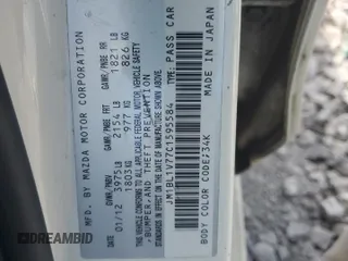2012 Mazda 3 i Touring with VIN JM1BL1V77C1595584, listed as a Copart auction lot 47190735 with 138,987 mi miles and Salvage Title. Bid and sale history available at DreamBid. Image 13.