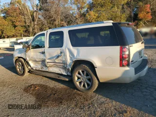2011 GMC Yukon XL Denali with VIN 1GKS1MEF9BR171665, listed as a Copart auction lot 82228324 with 145,013 mi miles and Salvage Title. Bid and sale history available at carsss.com. Image 2.