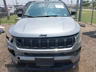 2023 Jeep Compass Latitude with VIN 3C4NJDBN5PT509999, listed as a IAAI auction lot 42206354 with 62,165 mi miles and . Bid and sale history available at DreamBid. Image 12.