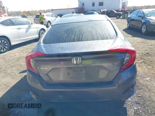 2017 Honda Civic Sedan LX with VIN 19XFC2F53HE204794, listed as a IAAI auction lot 40636416 with 134,629 mi miles. Bid and sale history available at carsss.com. Image 17.