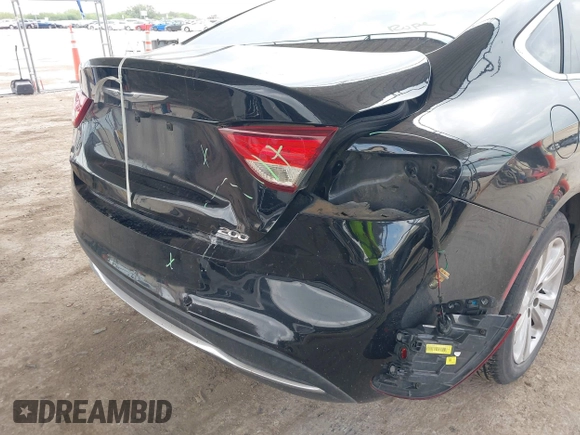 2015 Chrysler 200 Limited with VIN 1C3CCCAB2FN719935, listed as a IAAI auction lot 42191027 with 156,132 mi miles and . Bid and sale history available at DreamBid. Image 6.