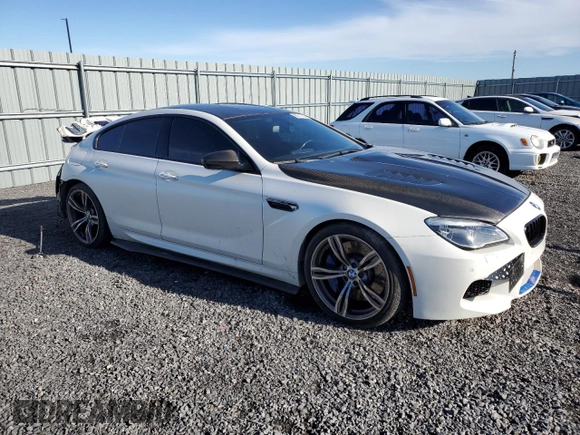 2017 BMW M6 with VIN WBS6E9C56HG437410, listed as a Copart auction lot 80217694 with 68,335 mi miles and Salvage title. Bid and sale history available at DreamBid. Image 4.