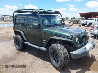 2012 Jeep Wrangler Sahara z VIN 1C4AJWBGXCL100527, wystawiony jako IAAI lot #42394623 z przebiegiem 126 097 mil mil oraz . Historia ofert i sprzedaży dostępna na DreamBid. Obrazek 1.