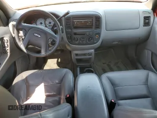 2002 Ford Escape XLT Choice with VIN 1FMCU04122KB12659, listed as a Copart auction lot 63816155 with 256,536 mi miles and Salvage title. Bid and sale history available at DreamBid. Image 8.