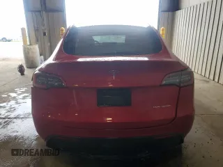 2023 Tesla Model Y Long Range z VIN 7SAYGAEE8PF701618, wystawiony jako Copart lot #57573875 z przebiegiem 39 463 mil mil oraz Szkoda całkowita • Salvage title. Historia ofert i sprzedaży dostępna na DreamBid. Obrazek 6.