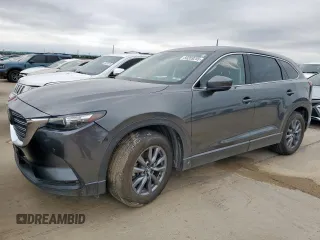 2022 Mazda CX-9 Touring z VIN JM3TCBCY8N0624323, wystawiony jako Copart lot #59359255 z przebiegiem 123 345 mil mil oraz Szkoda całkowita • Salvage title. Historia ofert i sprzedaży dostępna na DreamBid. Obrazek 1.