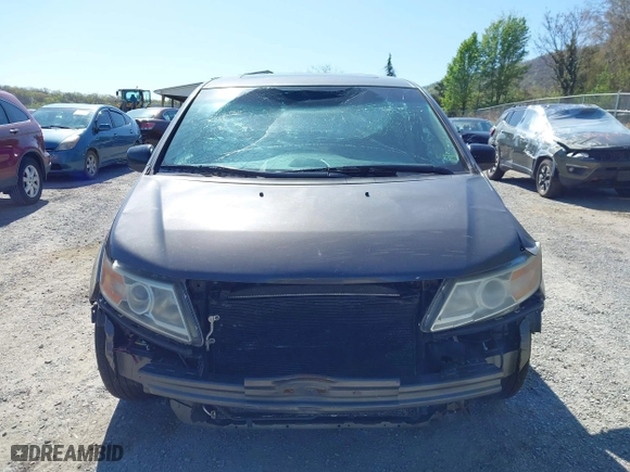 2011 Honda Odyssey EX-L with VIN 5FNRL5H60BB072101, listed as a IAAI auction lot 42002097 with 243,607 mi miles. Bid and sale history available at carsss.com. Image 12.