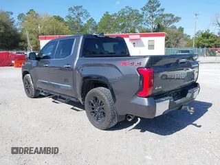 2022 Toyota Tundra 1794 Edition with VIN 5TFMA5DB9NX015571, listed as a IAAI auction lot 41730283 with 76,429 mi miles and . Bid and sale history available at DreamBid. Image 3.