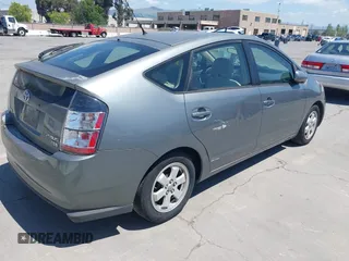 2005 Toyota Prius with VIN JTDKB20U553008263, listed as a IAAI auction lot 42149210 with 235,510 mi miles. Bid and sale history available at carsss.com. Image 4.