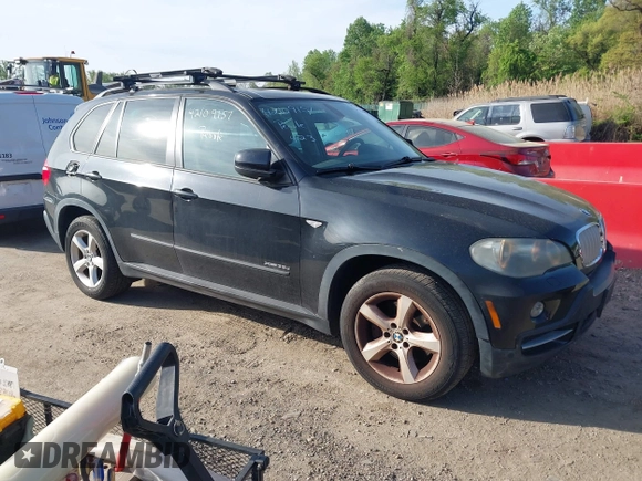2010 BMW X5 35d with VIN 5UXFF0C52ALJ99499, listed as a IAAI auction lot 42109157 with 126,797 mi miles. Bid and sale history available at carsss.com. Image 1.