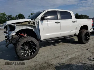 2020 Toyota Tundra SR5 with VIN 5TFDY5F1XLX889215, listed as a Copart auction lot 61110495 with 35,734 mi miles and Salvage title. Bid and sale history available at DreamBid. Image 1.