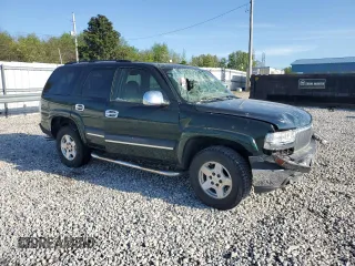 2004 Chevrolet Tahoe LS z VIN 1GNEC13Z24R174609, wystawiony jako Copart lot #52234105 z przebiegiem 182 306 mil mil oraz Szkoda całkowita • Salvage title. Historia ofert i sprzedaży dostępna na DreamBid. Obrazek 4.