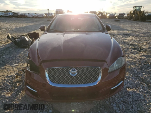 2012 Jaguar XJ with VIN SAJWA1CB3CLV37685, listed as a Copart auction lot 87586005 with 59,885 mi miles and Salvage title. Bid and sale history available at DreamBid. Image 5.
