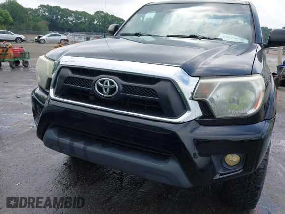 2014 Toyota Tacoma with VIN 5TFLU4EN5EX101434, listed as a IAAI auction lot 42273927 with 216,394 mi miles and . Bid and sale history available at DreamBid. Image 6.