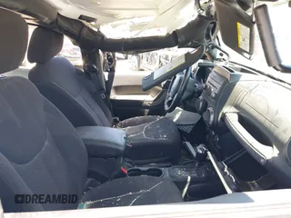2013 Jeep Wrangler Sport with VIN 1C4AJWAG3DL627179, listed as a IAAI auction lot 42262246 with 33,536 mi miles and . Bid and sale history available at DreamBid. Image 5.