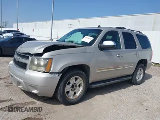 2009 Chevrolet Tahoe 2LT z VIN 1GNEC23379R258434, wystawiony jako IAAI lot #41558672 z przebiegiem 133 646 mil mil oraz . Historia ofert i sprzedaży dostępna na DreamBid. Obrazek 18.