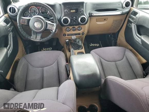 2013 Jeep Wrangler Unlimited Sahara with VIN 1C4HJWEG9DL701391, listed as a Copart auction lot 60492325 with 117,584 mi miles and Salvage title. Bid and sale history available at DreamBid. Image 8.