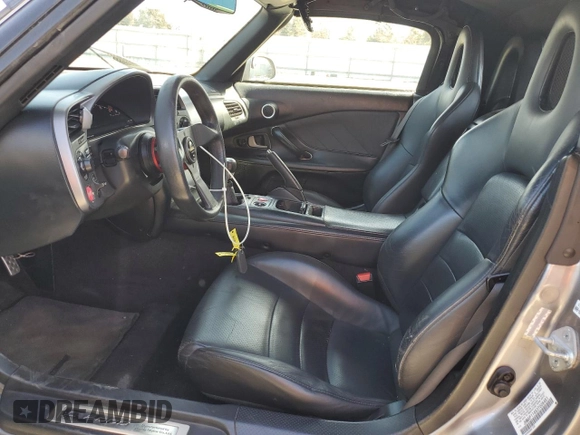 2003 Honda S2000 with VIN JHMAP11483T006461, listed as a Copart auction lot 52099995 with 187,376 mi miles and Salvage Title. Bid and sale history available at DreamBid. Image 7.
