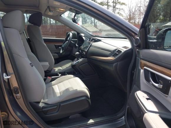 2021 Honda CR-V EX with VIN 2HKRW1H59MH404256, listed as a IAAI auction lot 41711235 with 100,389 mi miles. Bid and sale history available at carsss.com. Image 5.