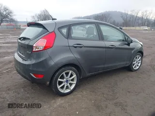 2018 Ford Fiesta SE with VIN 3FADP4EJ9JM126299, listed as a IAAI auction lot 41660973 with 74,730 mi miles. Bid and sale history available at carsss.com. Image 4.