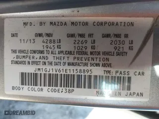 2014 Mazda Mazda6 i Touring with VIN JM1GJ1V61E1158895, listed as a IAAI auction lot 41705530 with NaN miles. Bid and sale history available at carsss.com. Image 9.