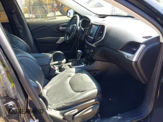 2018 Jeep Cherokee Trailhawk Leather Plus with VIN 1C4PJMBXXJD572667, listed as a IAAI auction lot 42216477 with 85,890 mi miles and . Bid and sale history available at DreamBid. Image 5.