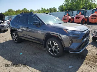 2022 Toyota RAV4 XSE with VIN JTMFB3FV9ND101157, listed as a Copart auction lot 59044315 with 54,591 mi miles and Salvage title. Bid and sale history available at DreamBid. Image 4.