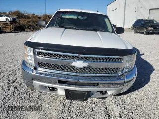 2013 Chevrolet Silverado 1500 LT with VIN 3GCPKSE72DG230652, listed as a Copart auction lot 83632464 with 121,411 mi miles and Salvage Title. Bid and sale history available at DreamBid. Image 5.