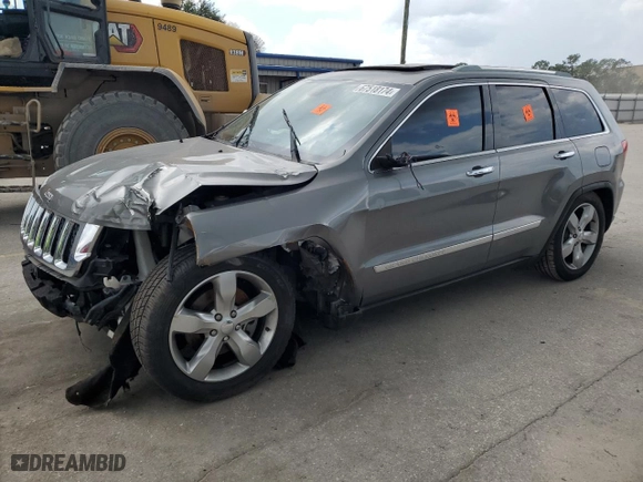 2011 Jeep Grand Cherokee Overland with VIN 1J4RR6GT8BC589021, listed as a Copart auction lot 67518174 with 0 mi miles and Salvage Title. Bid and sale history available at carsss.com. Image 1.