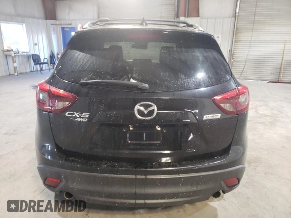2016 Mazda CX-5 Grand Touring with VIN JM3KE4DY6G0655802, listed as a Copart auction lot 43820475 with 76,639 mi miles and Salvage Title. Bid and sale history available at carsss.com. Image 6.