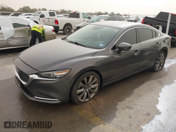 2020 Mazda 6 Signature with VIN JM1GL1XY6L1522900, listed as a IAAI auction lot 41724818 with 62,846 mi miles and . Bid and sale history available at DreamBid. Image 19.