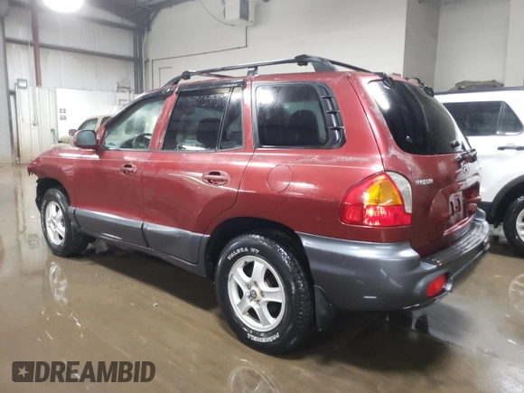 2002 Hyundai Santa Fe with VIN KM8SB12B72U223425, listed as a Copart auction lot 83005324 with 76,067 mi miles and Salvage Title. Bid and sale history available at carsss.com. Image 2.