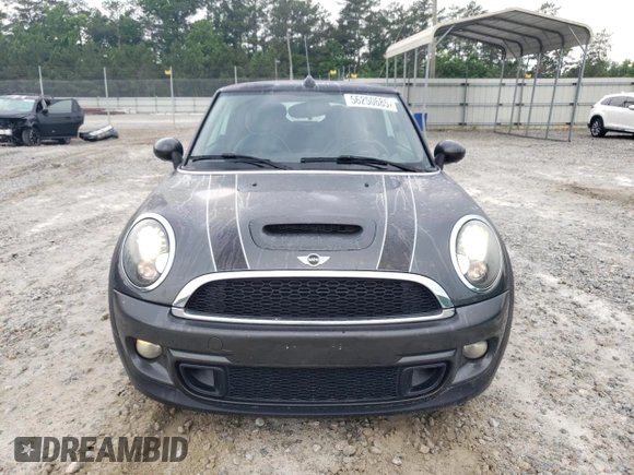2013 MINI Convertible S с VIN WMWZP3C58DT550592, выставлен на аукционе Copart как лот 56250685 с пробегом 141 821 миль миль и Списание • Salvage title. История ставок и продаж доступна на DreamBid. Изображение 5.