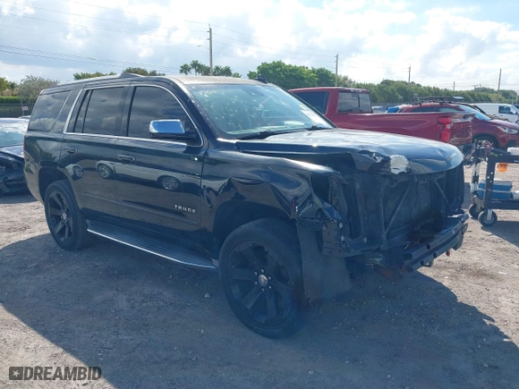 2015 Chevrolet Tahoe LTZ with VIN 1GNSCCKC7FR746028, listed as a IAAI auction lot 41674775 with 198,067 mi miles. Bid and sale history available at carsss.com. Image 1.