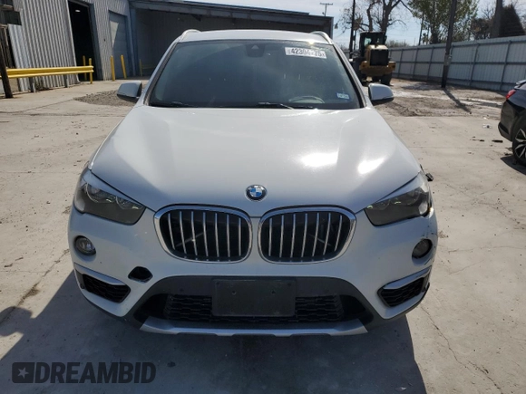 2019 BMW X1 sDrive28i with VIN WBXHU7C52K3H44195, listed as a Copart auction lot 42304175 with 88,929 mi miles and Salvage Title. Bid and sale history available at carsss.com. Image 5.