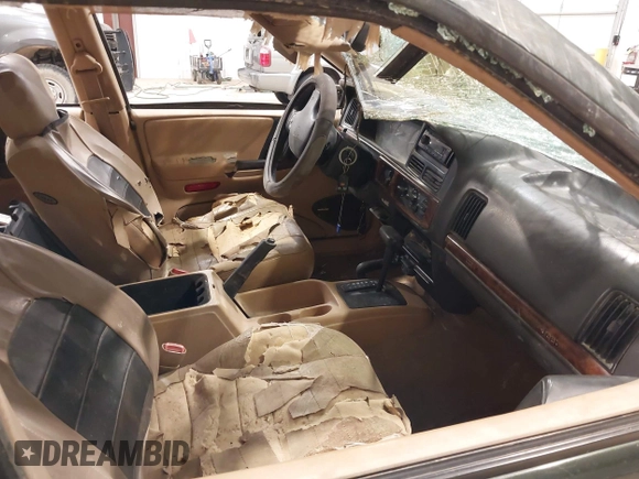 1997 Jeep Grand Cherokee Laredo z VIN 1J4GZ58YXVC729117, wystawiony jako IAAI lot #42244799 z przebiegiem Nie podano mil oraz . Historia ofert i sprzedaży dostępna na DreamBid. Obrazek 5.