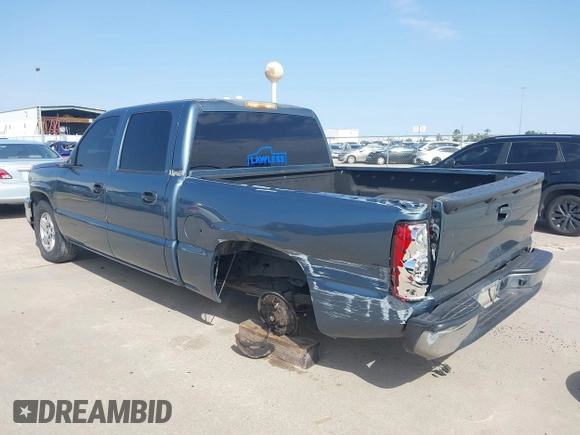 2006 Chevrolet Silverado 1500 LT1 with VIN 2GCEK13Z961322732, listed as a IAAI auction lot 41569252 with 306,896 mi miles. Bid and sale history available at carsss.com. Image 3.