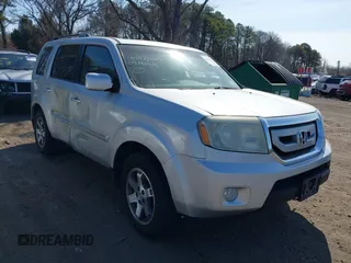 2009 Honda Pilot Touring z VIN 5FNYF48959B020092, wystawiony jako IAAI lot #41789974 z przebiegiem 195 200 mil mil oraz . Historia ofert i sprzedaży dostępna na DreamBid. Obrazek 1.