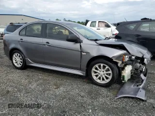 2014 Mitsubishi Lancer ES with VIN JA32U2FUXEU003358, listed as a Copart auction lot 55555935 with 185,151 mi miles and Salvage title. Bid and sale history available at DreamBid. Image 4.